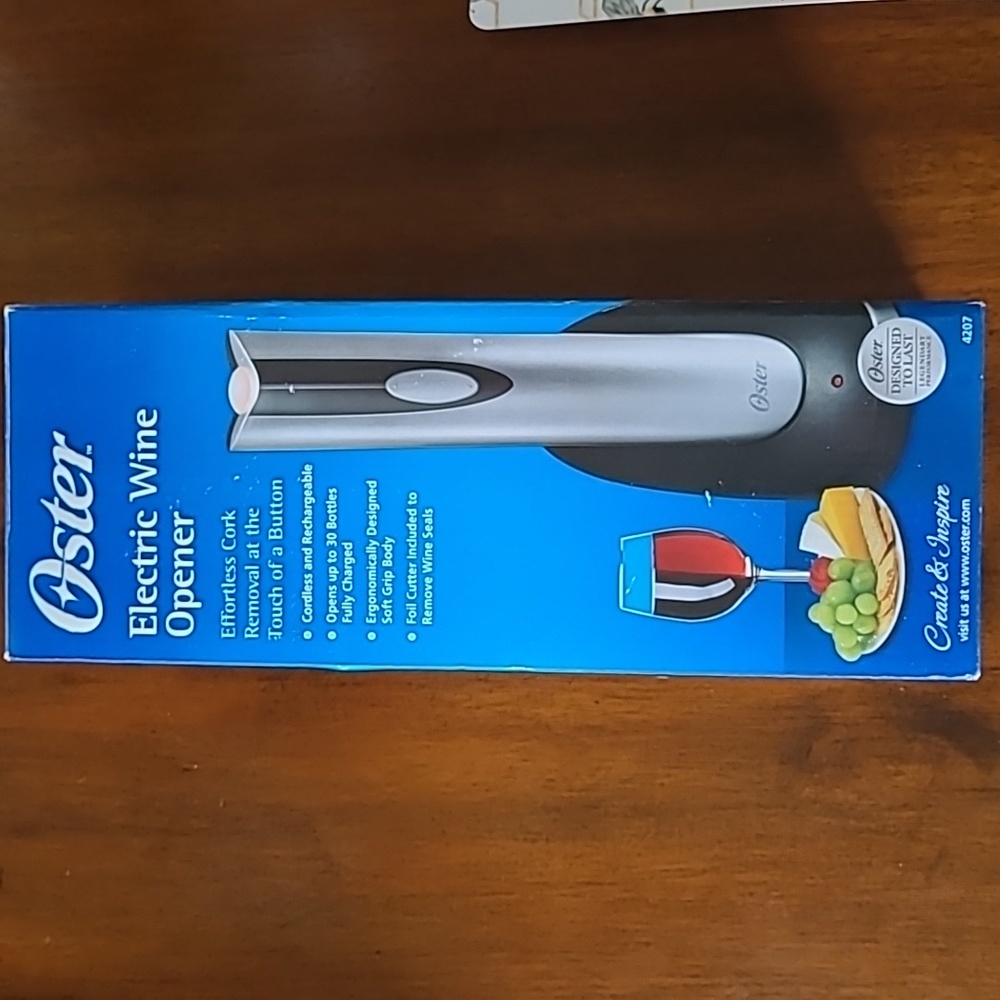 Oster electric wine opener, new in box, never used